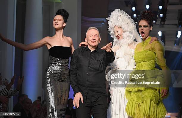 Anna Cleveland, Jean Paul Gaultier, Soo Joo Park and Coco Rocha are seen on the runway during the Jean Paul Gaultier Haute Couture Fall/Winter...