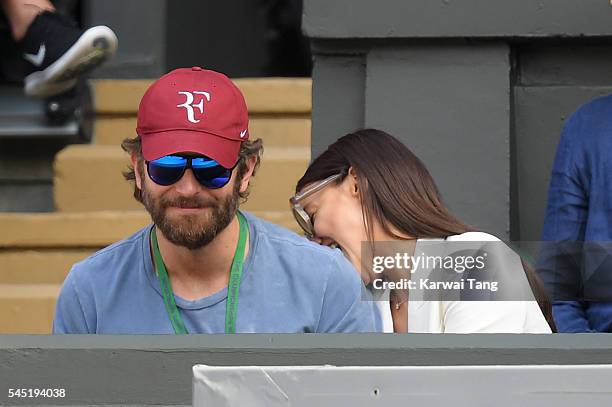 Bradley Cooper and Irina Shayk attend day nine of the Wimbledon Tennis Championships at Wimbledon on July 06, 2016 in London, England.