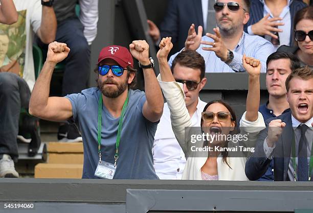 Bradley Cooper and Irina Shayk attend day nine of the Wimbledon Tennis Championships at Wimbledon on July 06, 2016 in London, England.