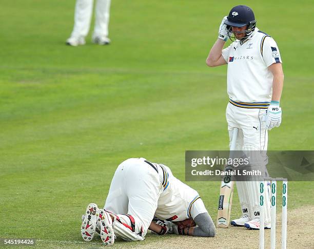 Tim Bresnan of Yorkshire lays on the ground after being hit by a delivery during day four of the Specsavers County Championship division one match...