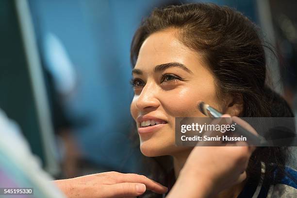 Shanina Shaik prepares backstage to walk as the bride during the Ralph & Russo Haute Couture Fall/Winter 2016-2017 show as part of Paris Fashion Week...