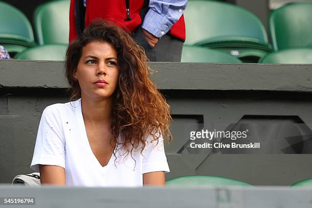 Jo-Wilfried Tsonga of France's girlfriend Noura El Shwekh looks on from Centre Court on day nine of the Wimbledon Lawn Tennis Championships at the...