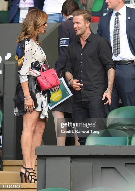 Mirka Federer and David Beckham attend day nine of the Wimbledon Tennis Championships at Wimbledon on July 06, 2016 in London, England.