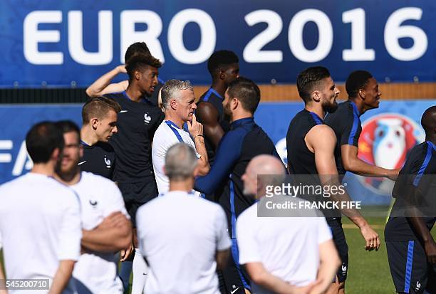 France's coach Didier Deschamps looks on during a training session by French players in the southern French city of Marseille on July 6, 2016 on the...