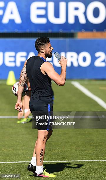 France's forward Olivier Giroud attends a training session by French football players in the southern French city of Marseille on July 6, 2016 on the...