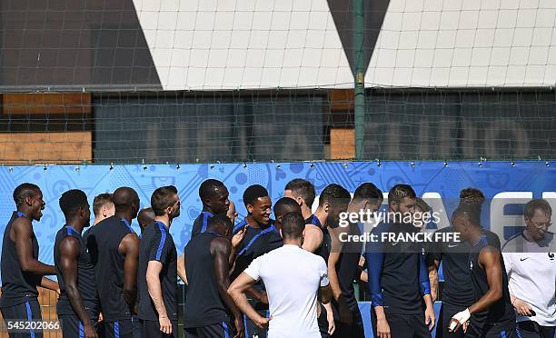 The France football team arrive for a training session in the southern French city of Marseille on July 6, 2016 on the eve of their Euro 2016...