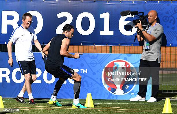 France's defender Adil Rami takes part in a training session in the southern French city of Marseille on July 6, 2016 on the eve of their Euro 2016...