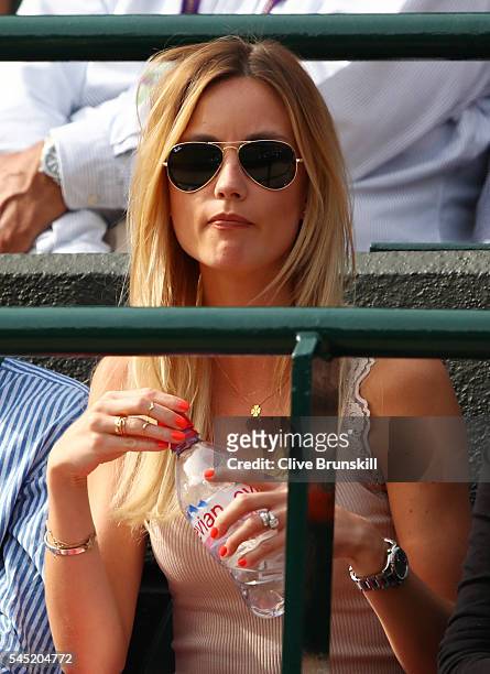 Ester Satorova, the wife of Tomas Berdych of The Czech republic watches on from court one on day nine of the Wimbledon Lawn Tennis Championships at...