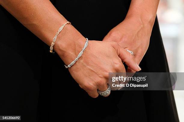 Melissa Gorga, bracelet/ring detail, visits "Extra" at their New York studios at H&M in Times Square on July 6, 2016 in New York City.