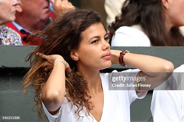 Jo-Wilfried Tsonga of France's girlfriend Noura El Shwekh looks on from Centre Court on day nine of the Wimbledon Lawn Tennis Championships at the...