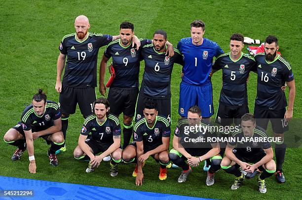 Wales' forward Gareth Bale, Wales' midfielder Joe Allen, Wales' defender Neil Taylor, Wales' defender Chris Gunter and Wales' midfielder Andy King...