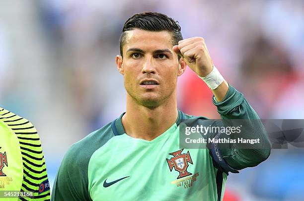 Cristiano Ronaldo of Portugal gestures to the crowd beforethe UEFA EURO 2016 semi final match between Portugal and Wales at Stade des Lumieres on...