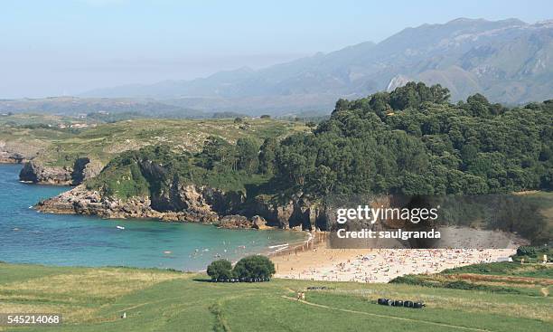 toranda beach in summertime, council of llanes, asturias, spain - llanes stock-fotos und bilder