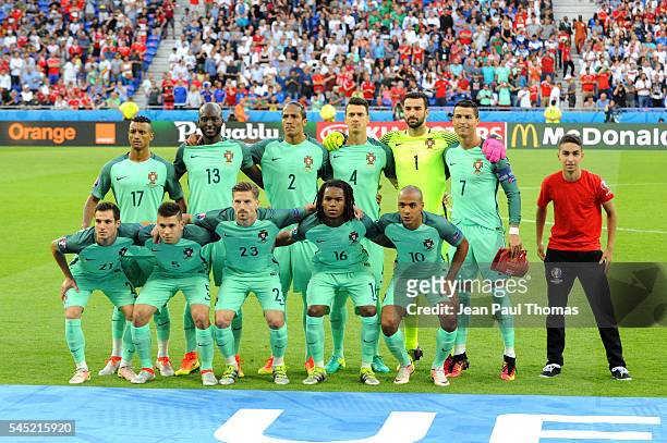 Team of Portugal in line up with a fan during the Uefa Euro Semi final between Wales and Portugal at Stade des Lumieres on July 6, 2016 in Lyon,...