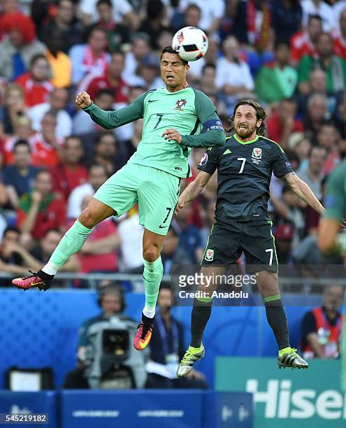 Cristiano Ronaldo of Portugal in action against Joe Allen of Wales during the UEFA Euro 2016 semi final match between Portugal and Wales at Stade de...