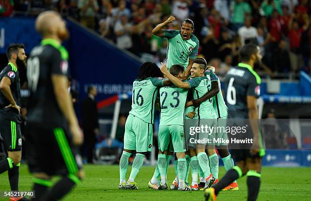 Bruno Alves and Portugal players celebrate their team's second goal scored by Nani during the UEFA EURO 2016 semi final match between Portugal and...