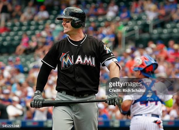 Chris Johnson of the Miami Marlins reacts after striking out in the first inning inning against the New York Mets at Citi Field on July 6, 2016 in...