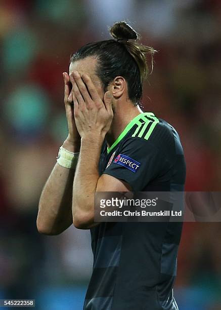 Gareth Bale of Wales looks dejected during the UEFA Euro 2016 Semi Final match between Portugal and Wales at Stade de Lyon on July 06, 2016 in Lyon,...