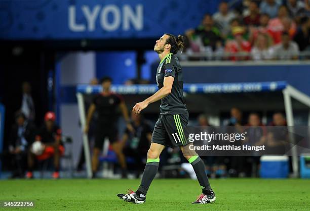 Gareth Bale of Wales reacts during the UEFA EURO 2016 semi final match between Portugal and Wales at Stade des Lumieres on July 6, 2016 in Lyon,...