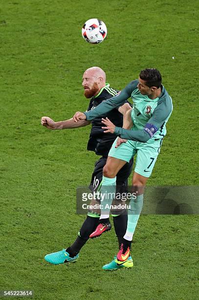 Cristiano Ronaldo of Portugal in action against James Collins of Wales during the UEFA Euro 2016 semi final match between Portugal and Wales at Stade...