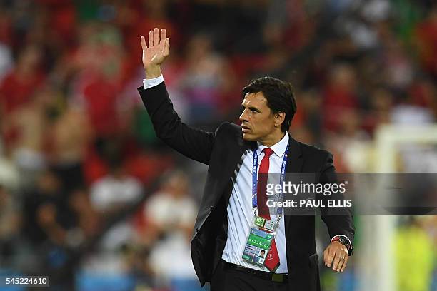 Wales' coach Chris Coleman reacts at the end of the Euro 2016 semi-final football match between Portugal and Wales at the Parc Olympique Lyonnais...