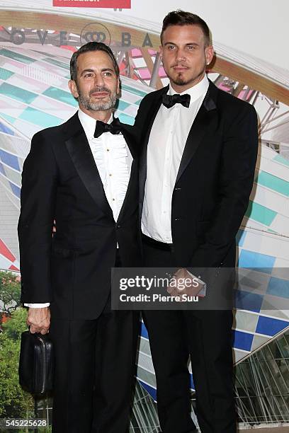 Marc Jacobs and Charles Defrancesco attend the "The Art of Giving" Love Ball Naked Heart foundation : Photo Call as part of Paris Fashion Week on...