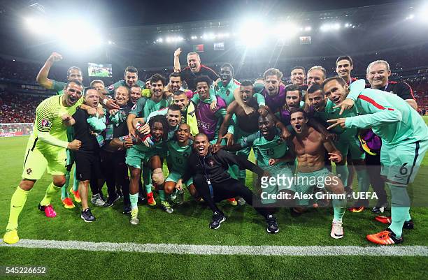 Portugal players celebrate their team's win after the UEFA EURO 2016 semi final match between Portugal and Wales at Stade des Lumieres on July 6,...