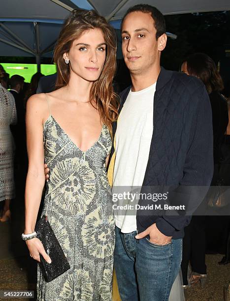 Elisa Sednaoui and Alex Dellal attend The Serpentine Summer Party co-hosted by Tommy Hilfiger on July 6, 2016 in London, England.