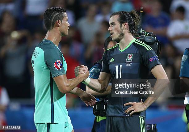 Cristiano Ronaldo of Portugal greets Gareth Bale of Wales following the UEFA Euro 2016 semi-final between Wales and Portugal at Parc OL, Stade des...