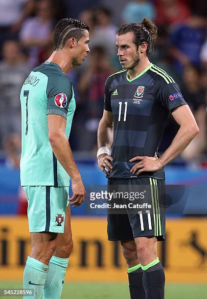 Cristiano Ronaldo of Portugal greets Gareth Bale of Wales following the UEFA Euro 2016 semi-final between Wales and Portugal at Parc OL, Stade des...