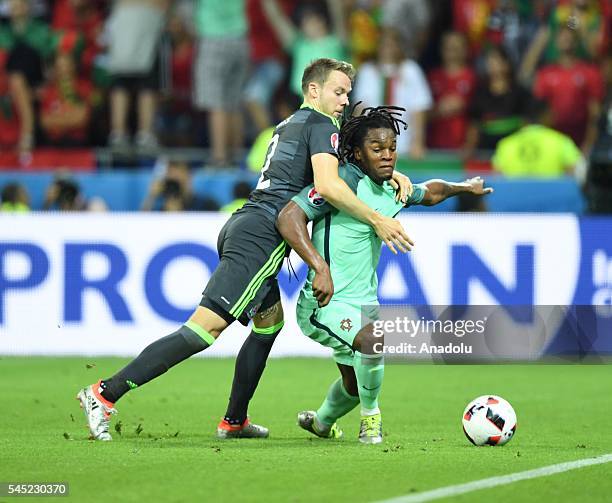 Bruno Alves of Portugal in action against Chris Gunter of Wales during the UEFA Euro 2016 semi final match between Portugal and Wales at Stade de...