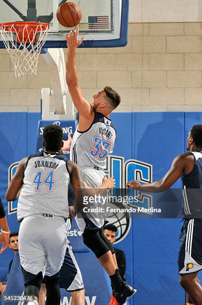 Mitch McGary of Oklahoma City Thunder shoots a lay up during the game against the Indiana Pacers during the 2016 NBA Orlando Summer League on July 6,...