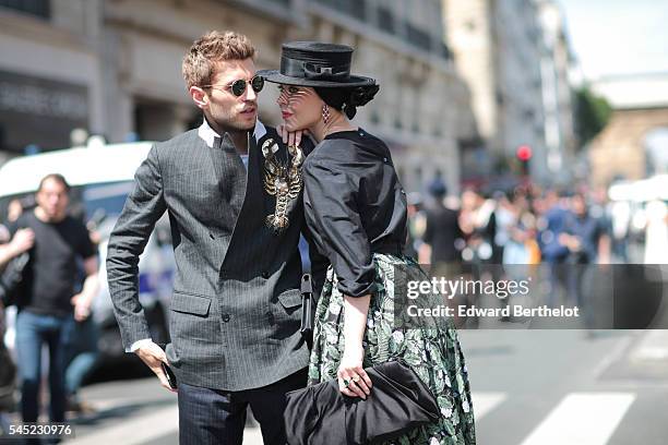 Ulyana Sergeenko and Frol Burimskiy, after the Jean Paul Gaultier show, during Paris Fashion Week Haute Couture F/W 2016/2017, on July 6, 2016 in...