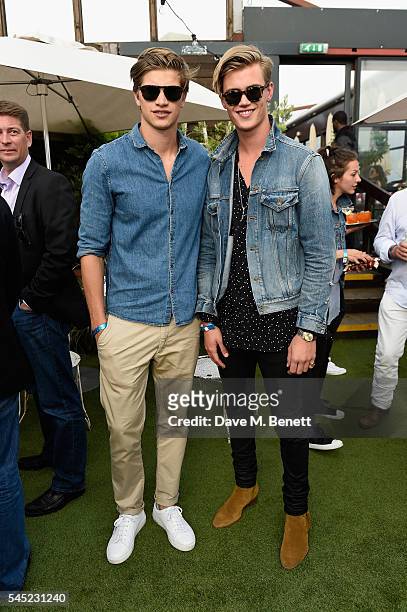 Samuel Harwood and Toby Huntington-Whiteley attend Warner Music Group Summer party in association with British GQ and Quintessentially on July 6,...
