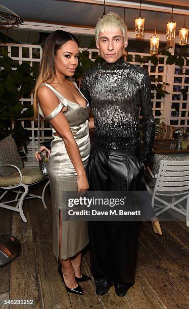 Sarah-Jane Crawford and Kyle De'Volle attend Warner Music Group Summer party in association with British GQ and Quintessentially on July 6, 2016 in...