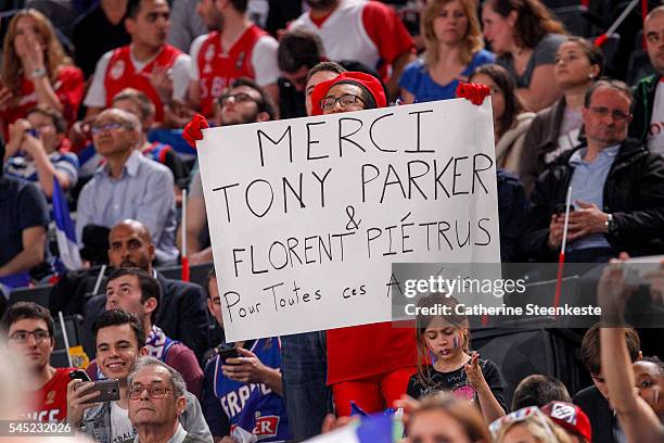 French fan is holding a nice note for the French players during the International Friendly game between France v Serbia at AccorHotels Arena on June...