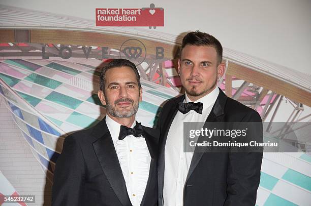 Marc Jacobs and Charles Defrancesco attend the "The Art of Giving" Love Ball Naked Heart Foundation Photo Call as part of Paris Fashion Week Haute...