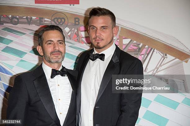 Marc Jacobs and Charles Defrancesco attend the "The Art of Giving" Love Ball Naked Heart Foundation Photo Call as part of Paris Fashion Week Haute...