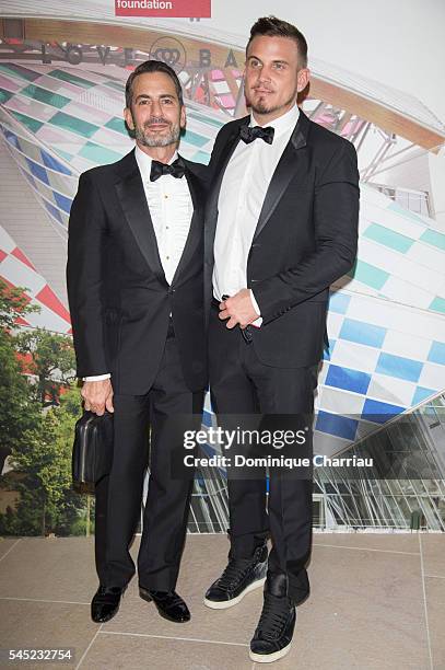 Marc Jacobs and Charles Defrancesco attend the "The Art of Giving" Love Ball Naked Heart Foundation Photo Call as part of Paris Fashion Week Haute...