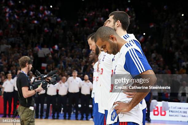 Tony Parker of France and team France are concentrating during the national anthem prior to the International Friendly game between France v Serbia...