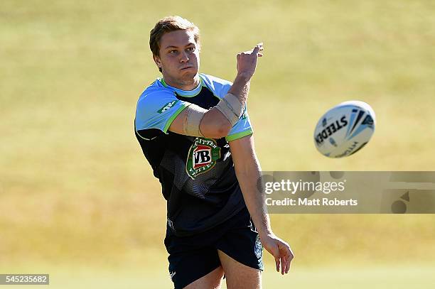 Matt Moylan of the Blues passes the ball during the New South Wales State of Origin training session on July 7, 2016 in Coffs Harbour, Australia.