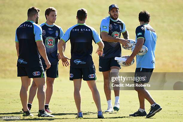 Coach Laurie Daley speaks with Jack Bird, James Tedesco, Blake Ferguson and Matt Moylan of the Blues during the New South Wales State of Origin...