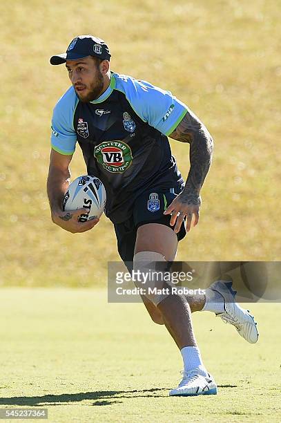 Blake Ferguson of the Blues runs with the ball during the New South Wales State of Origin training session on July 7, 2016 in Coffs Harbour,...