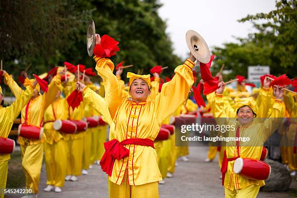 chinese women parade canada day - vancouver canada day stock pictures, royalty-free photos & images