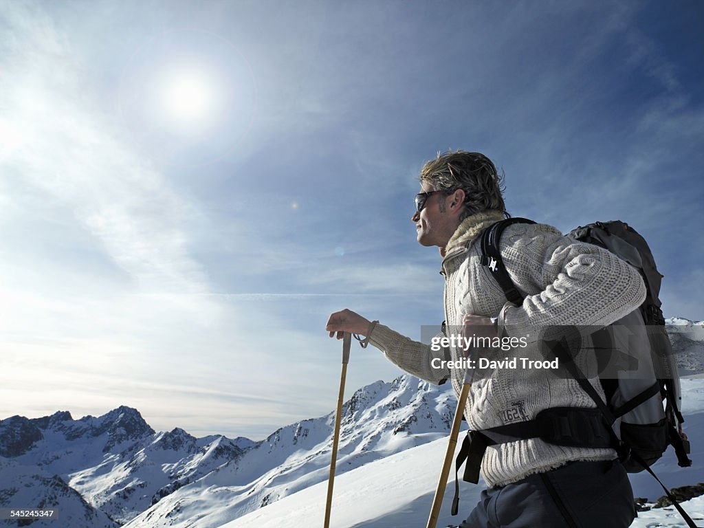 Man trekking in the Austrian Alps.