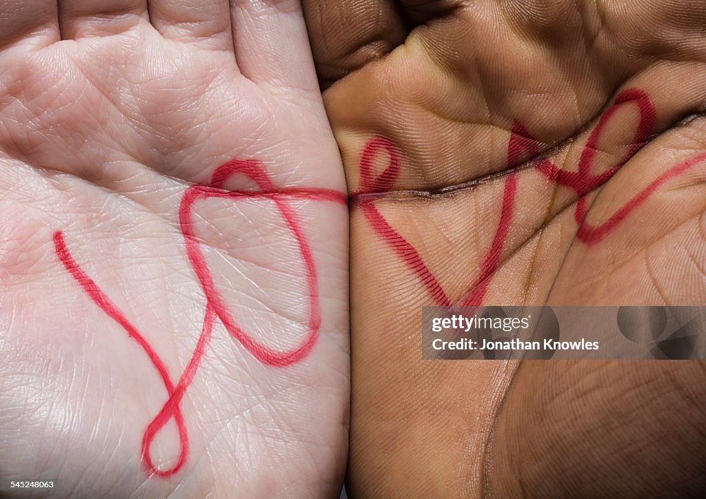 Love written across two hands