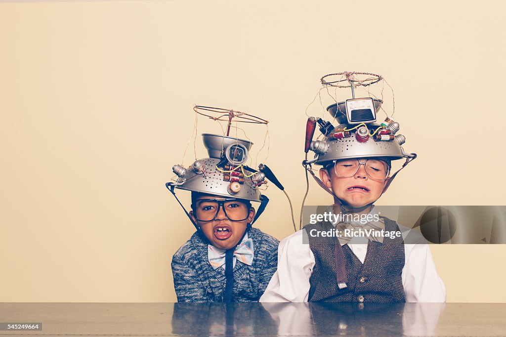Two Nerd Boys Show Distress with Mind Reading Helmets