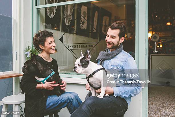 young couple having fun - coffee shop couple stock pictures, royalty-free photos & images