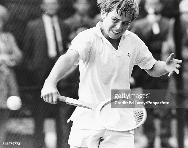 English tennis player John Lloyd in the middle of a match at the Junior All England Championships, Wimbledon, England, September 11th 1968.