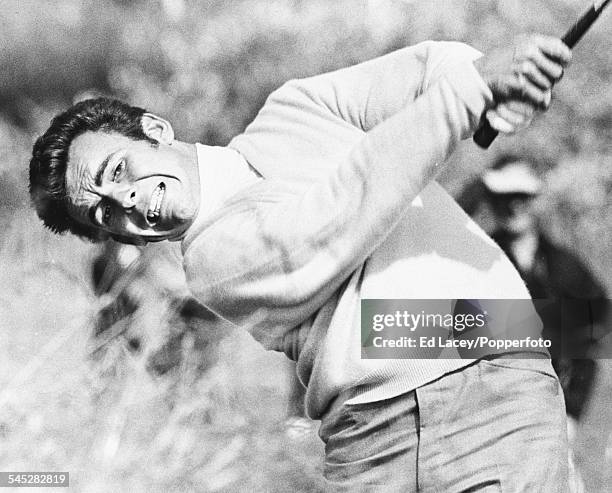 English golf player Tony Jacklin hitting his ball out of the rough, on the 15th hole during the 3rd round of the Open Championship, Royal Lytham & St...